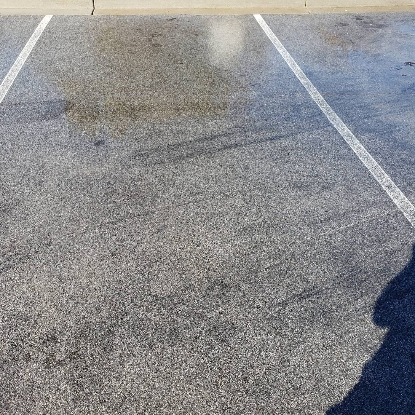 Same commercial parking lot restored