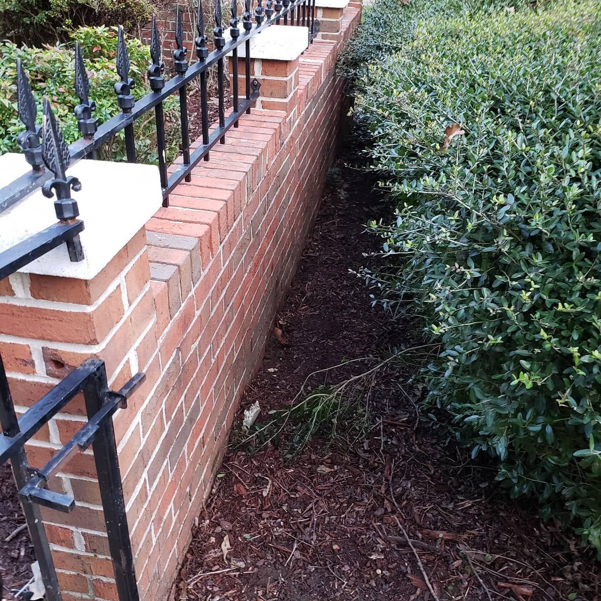 Restored brick capped fence