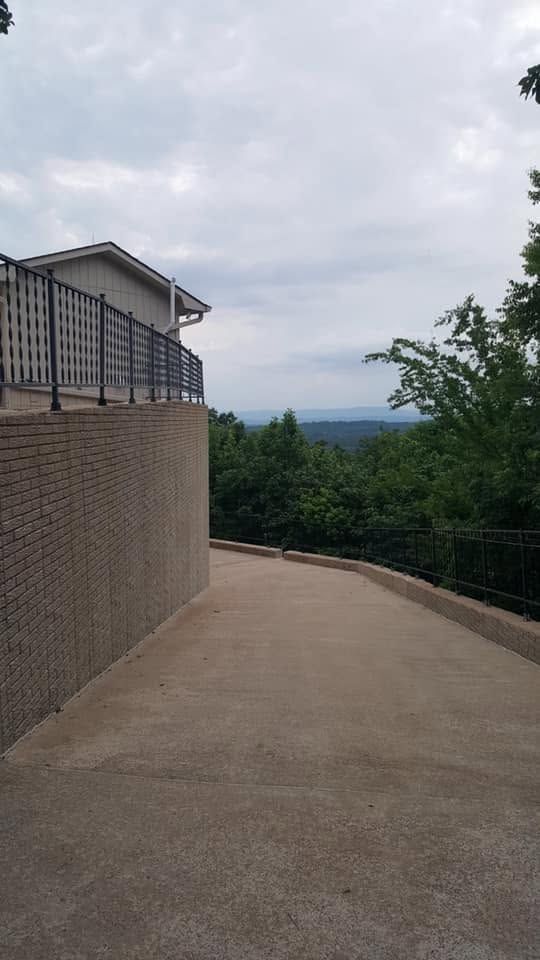 Same mountain home driveway restored after pressure washing