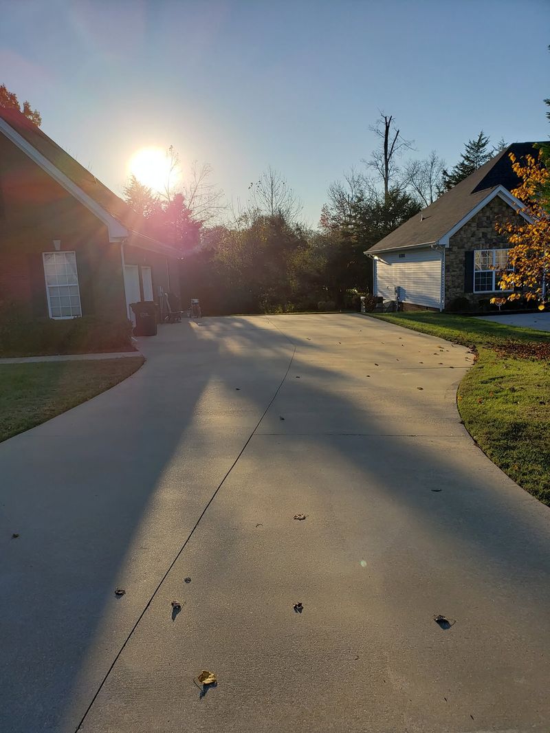 Same subdivision driveway restored after pressure washing