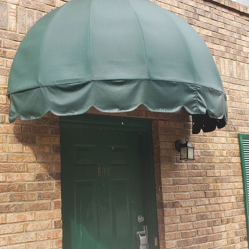 Same awning canopy after soft washing — surface restored