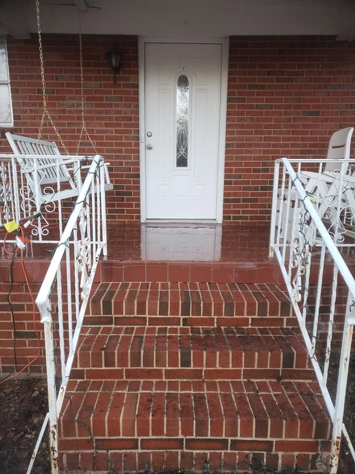 Same brick steps after soft washing — moss removed