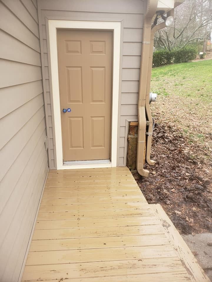 Same wood deck landing restored after cleaning