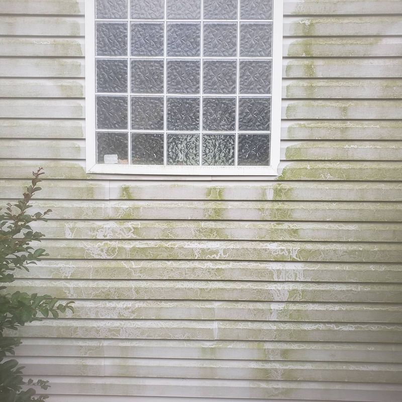 Glass block window area with dirt and grime before cleaning