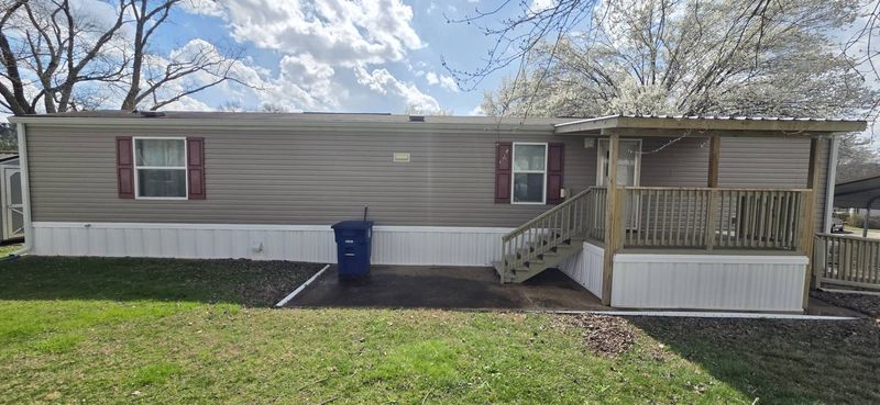 Same manufactured-home skirting cleaned with soft wash